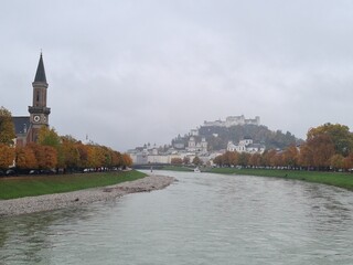 View of historic city of Salzburg over Salzach river,  fall Austria.