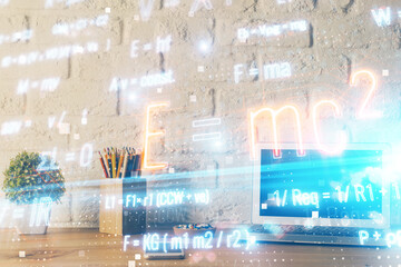 Desktop computer background and formula hologram writing. Double exposure. Education concept.