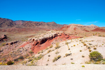 Fototapeta premium Red volcanic mountains in Altyn-Emel National Park, Kazakhstan, scenic desert landscape