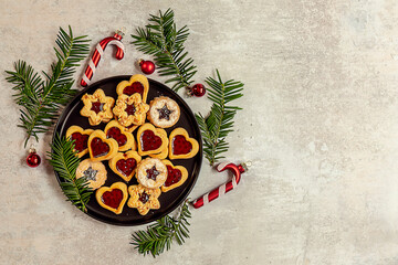 Traditional Austrian christmas cookies - Linzer biscuits filled with red berry jam