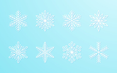 Christmas snowflakes collection white isolated on blue gradient background. Cute snow icons with intricate silhouette. Nice line doodle decorative element for New year banner, cards or ornament