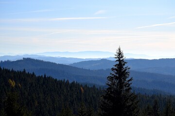 view of the ridges of the Beskydy mountains with the peaks of the mountains in the Slovak Orava in the background