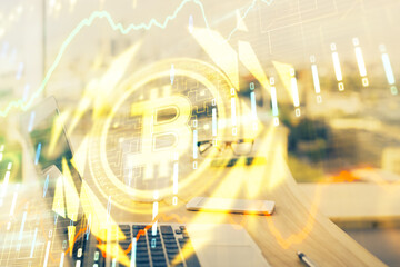 Double exposure of blockchain theme hologram and table with computer background. Concept of bitcoin...