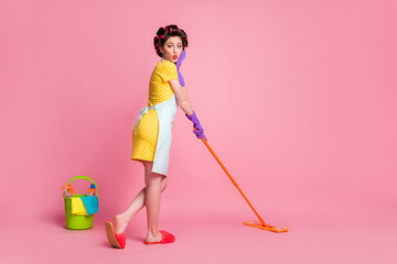 Full body photo of shocked girl house wife wash mop floor wear yellow dotted skirt dress isolated...