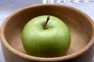 green apple in a bowl