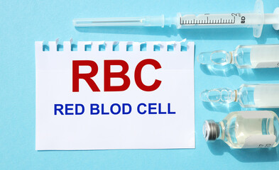 RBC RED BLOD CELL, meditsyna concept, text on white paper on light blue background