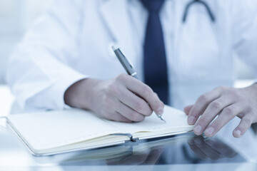 Doctor working in hospital patient consultation