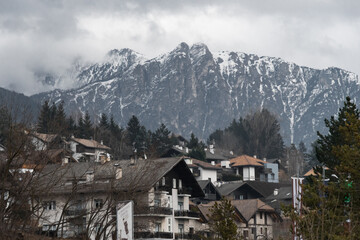 Fototapeta na wymiar Town at the feet of the Dolomite