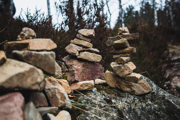 Stacked stones. Pyramid of different types of rocks. At Harz Mountains National Park, Germany