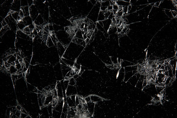 cracks on black glass background, broken abstract glass hole destruction concept