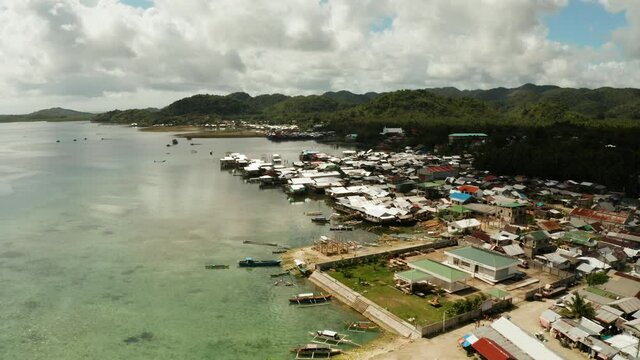 Fishing village and houses on stilts. Dapa city, Siargao, Philippines.