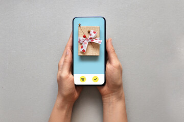 A person makes an online purchase of a gift in an online store. Fast delivery of goods