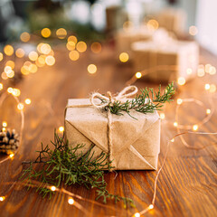 Craft wrapped present box on the wooden table