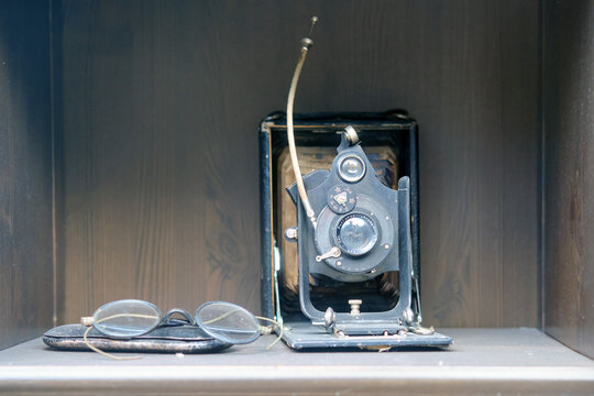 An old periskop camera is on a shelf in a retro closet - Moscow, Russia, July 31, 2020
