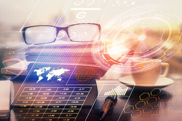 Data tech hologram with glasses on the table background. Concept of technology. Double exposure.