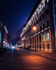 Berlin Germany, urban photography at night in the streets of the city with starry sky