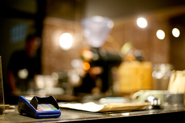 Payment with credit card. EDC machine on cashier restaurant