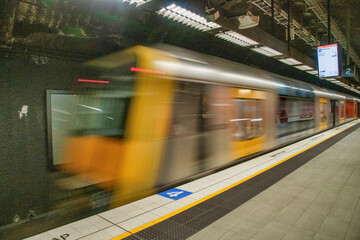SYDNEY, AUSTRALIA - AUGUST 20, 2018: Exterior of subway train speeding up