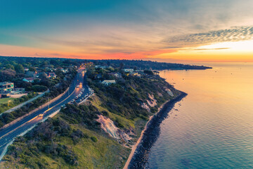 Aerial view of Nepean Highway passing through Olivers Hill in Frankston, Victoria at sunset