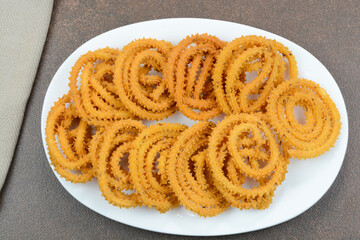 Murukku is a popular south indian savory and crunchy snack prepared during traditional festivals