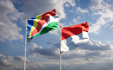 Beautiful national state flags of Seychelles and Indonesia.