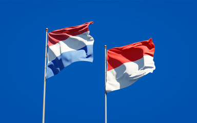 Beautiful national state flags of Netherlands and Indonesia.