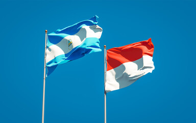 Beautiful national state flags of Nicaragua and Indonesia.
