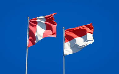 Beautiful national state flags of Peru and Indonesia.