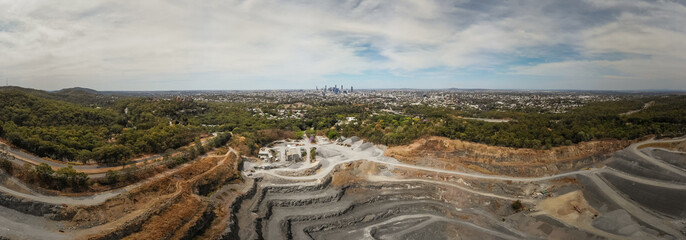 Panorama of a quarry with the city in the background