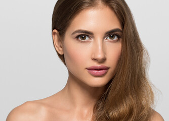 Fototapeta premium Beauty woman face healthy skin beautiful eyes close up 