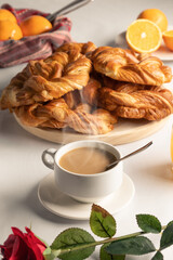 Breakfast with coffee, pastries, juice and cereals