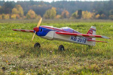 RC plane on a grassy runway