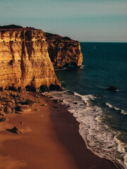 Panoramic view near Carvoeiro with rocks near Lagos in Algarve, Portugal. Cliff rocks and ocean in...