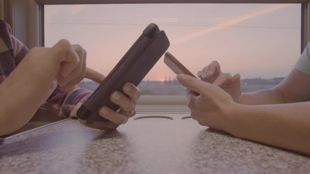 People use smartphones, hands touching sensor screen.
