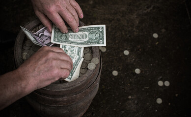 Concept of poverty, and destitution, money and coins. Poor people, need a help