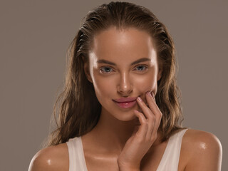 Fototapety  Beautiful woman face with healthy clean slon spa concept cosmetic skin care