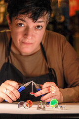 Stockholm, Sweden A silversmith in her studio