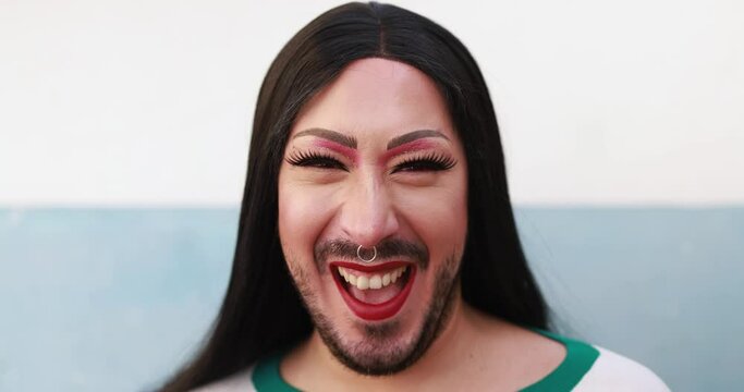 Happy drag queen laughing in front of camera - Lgbt and transgender concept 