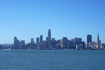 Fototapeta na wymiar San Francisco Downtown with Finance Business Building Tower view from Treasure Island at San Francisco, California, USA - Sunny sky day