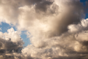 Beautiful cloudscape. Heavy clouds while a sunny day