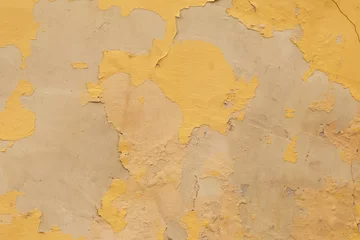 Papier Peint photo Vieux mur texturé sale Texture de fond abstrait grunge jaune. Vieux mur de ciment avec de la peinture craquelée jaune