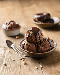 chocolate sorbet on a plate. Chocolate dessert. Chocolate ice cream balls
