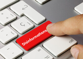Disinformations - Inscription on Red Keyboard Key. - obrazy, fototapety, plakaty