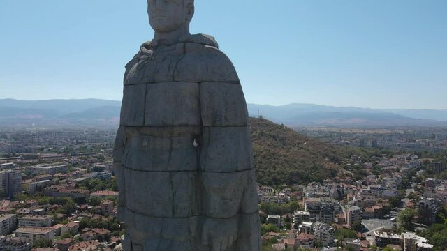 Aerial view of Monument of the Soviet Army known as Alyosha and panorama of city of Plovdiv, Bulgaria