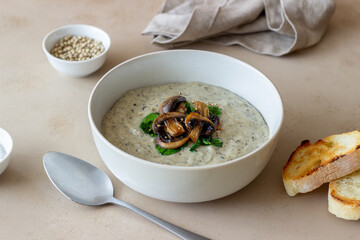 Cream soup with mushrooms and spinach. Healthy eating. Vegetarian food.