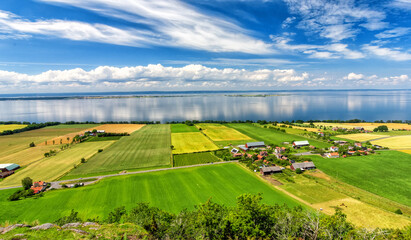 Swedish summer view over the country lake landmark - 391757505