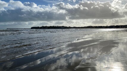 Blue sky and golden sandy beach at Swanage Dorset England UK Europe