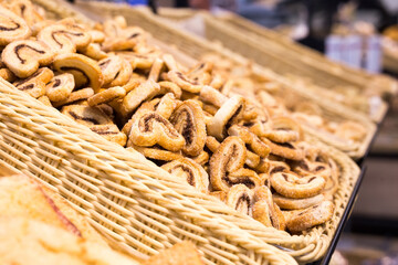 crispy cookies in wicker baskets on the counter
