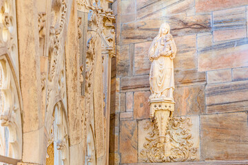 Roof of Milan Cathedral Duomo di Milano with Gothic spires and white marble statues. Top tourist...