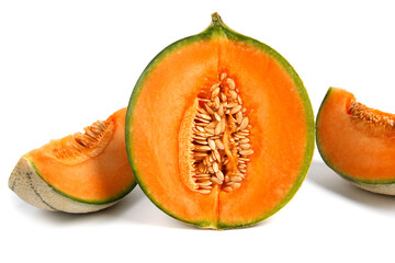 Half of the cantaloupe melon and a piece of melon are isolated on a white background.